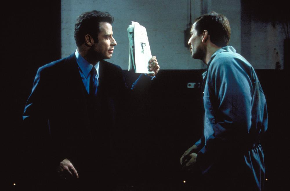 Face/Off, un confronto tra Nicolas Cage e John Travolta nel film