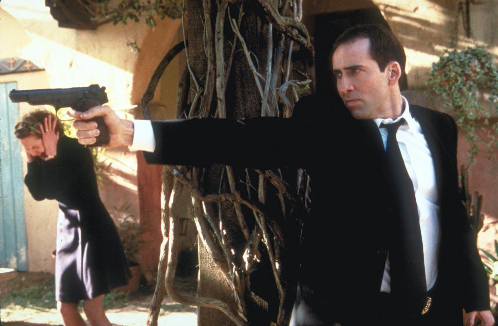 Face/Off, Nicolas Cage e Joan Allen in una scena del film