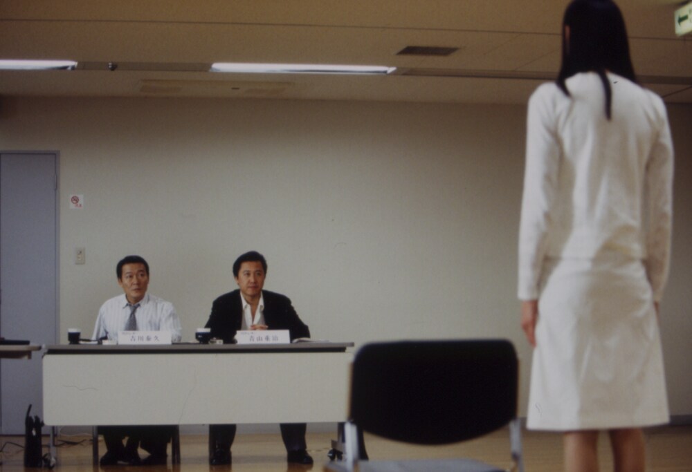 Audition, Ryo Ishibashi ed Eihi Shiina in una scena del film